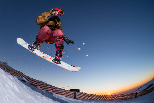 istock Snowboarding in the mountains 898983266