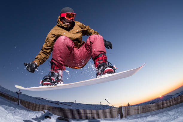 istock Snowboarding in the mountains 898983648