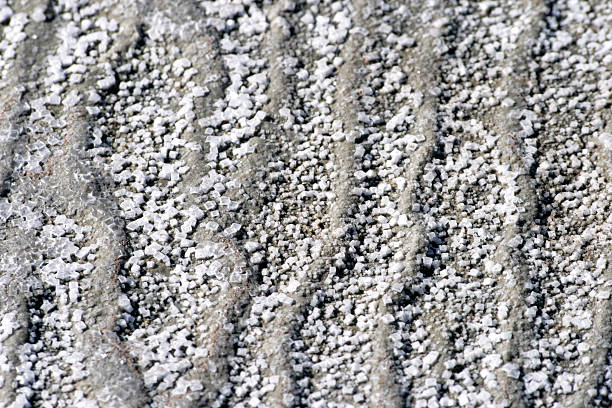 salt crystals on a wavy surface stock photo