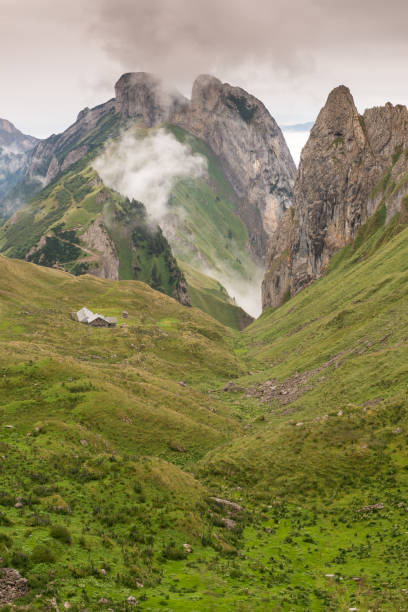 istock Cloudy day in the swiss alps 898985148