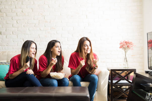 istock Excited women watching a game 898987880