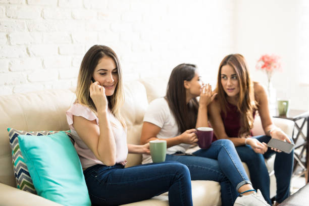 istock Women gossiping about a friends 898988628