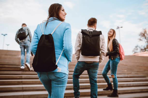 Group of Students with Backpacks Walking to School
