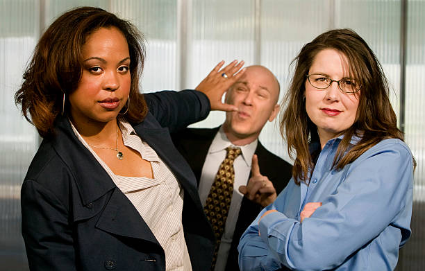 istock Businesswomen Push back a Businessman 89899410