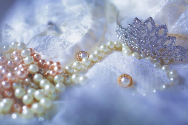 istock Tiara and pearls with wedding dress 898996972