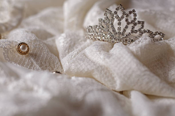 istock Tiara and pearls with wedding dress 898997842