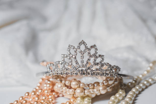 istock Tiara and pearls with wedding dress 898998034