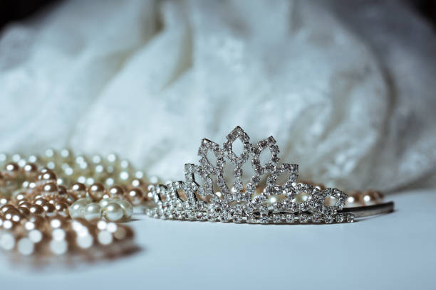 istock Tiara and pearls with wedding dress 898998036