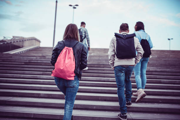istock Group of Students with Backpacks Walking to School 898999328