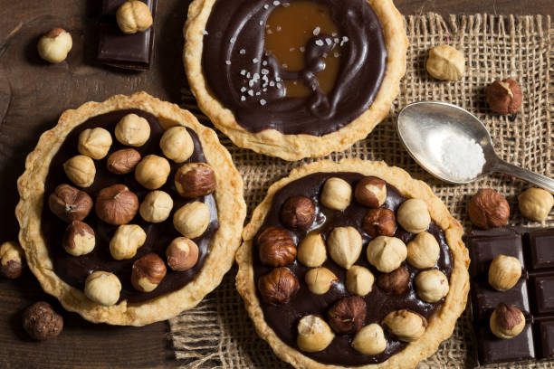 istock Chocolate and caramel tarts 899003412