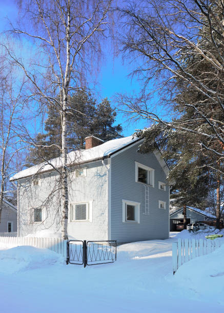 Rovaniemi, Finland - March 4, 2017: Cottage and trees at winter Rovaniemi, Finland.