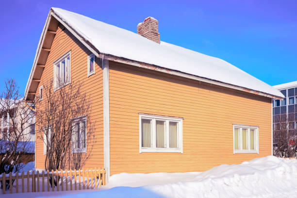 Rovaniemi, Finland - March 4, 2017: Snow covered Cottage, winter Rovaniemi, Finland.