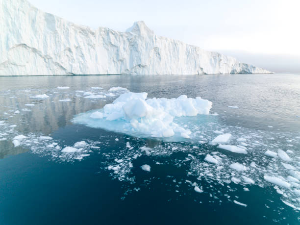 istock Long Icebergs on Arctic Ocean in Greenland 899004332