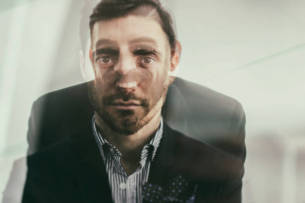 Abstract multiple exposure businessman portrait