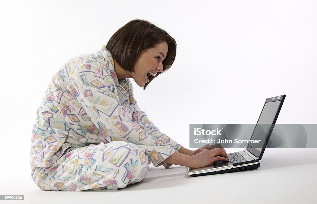 Happy girl on PC /file_thumbview_approve.php?size=1&id=8366425 Pajamas Stock Photo