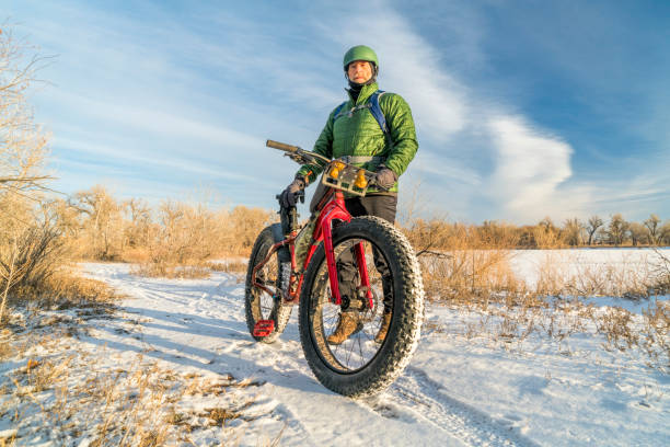 istock senior cyclist is riding a fat bike 899015258