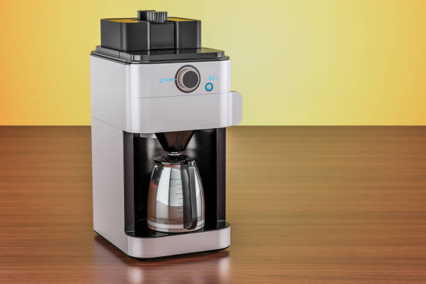 istock Modern coffeemaker or coffee machine on the wooden table. 3D rendering 899016666
