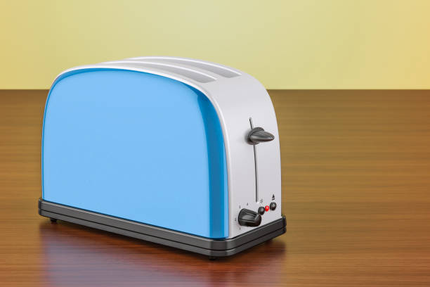 istock Toaster on the wooden table, 3D rendering 899016738