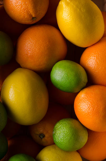 istock Close-up of limes, lemons and oranges. 899020400