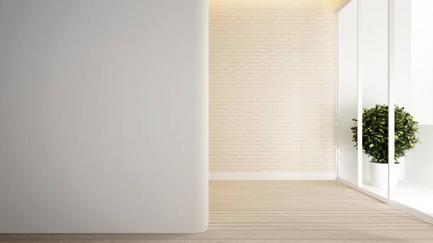istock empty room in apartment or hotel for artwork - clean design - Interior design - 3D Rendering 899022704
