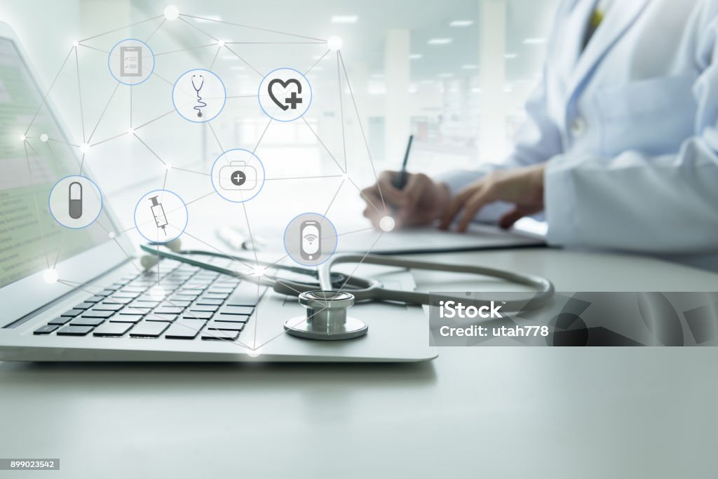 doctor office Doctor using a laptop computer contact with patient. Concepts of technology communication, medical online network. Healthcare And Medicine Stock Photo