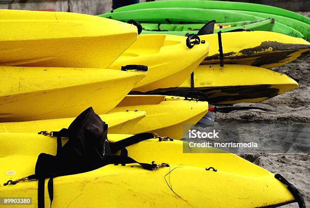 Kayaks In Yellow And Green Stock Photo - Download Image Now - Color Image, Craft, Handle