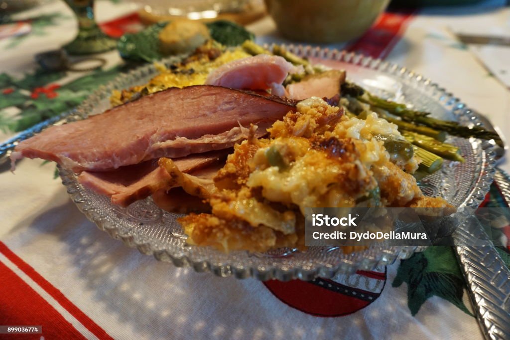 Christmas Brunch Table Selection of Christmas foods on table decorated for Christmas Holly Stock Photo