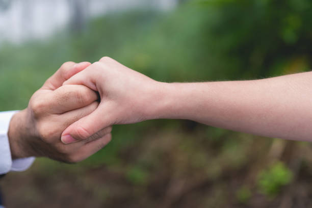 istock Newly-married couple holding hands 899043520