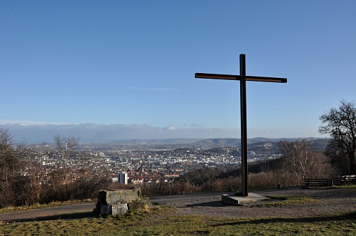 Huge iron cross on a hilltop overlooking the city of Stuttgart, Germany.