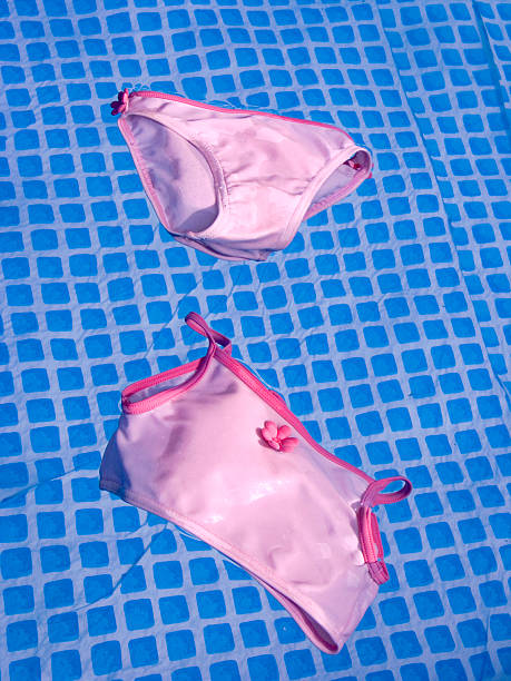 floating bikini stock photo