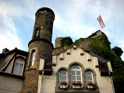 Neuchatel, Switzerland - September 09, 2015: Courtyard of the castle, architectural buildings date back to the 12th century. The Castle of Neuchatel is a Swiss heritage site of national significance. This is one of the countless wonderful places in Switzerland, which is a tourist attraction often visited by many tourists from all over the world.