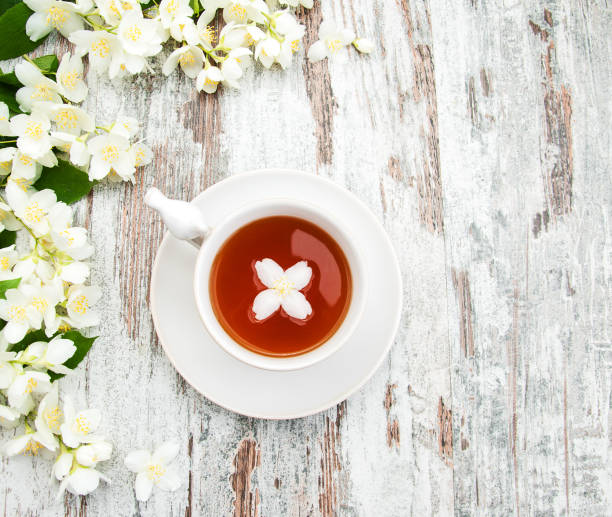 istock Cup of tea with jasmine flowers 899064154