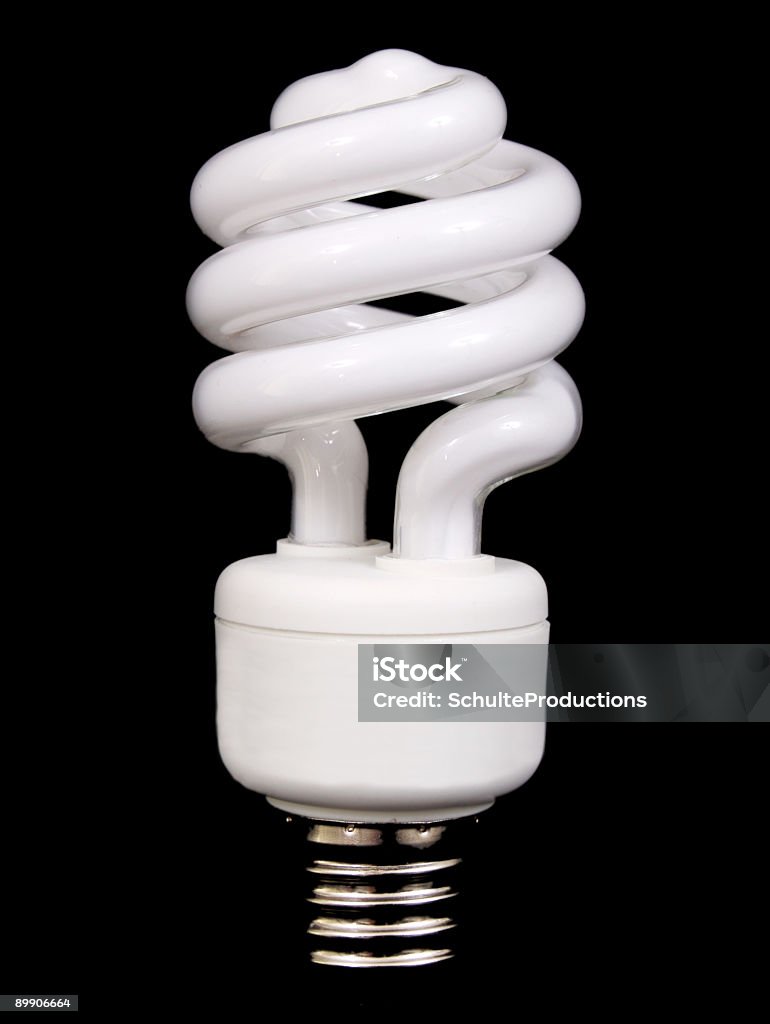 Energy Saver Bulb a energy saving bulb isolated on black. Black Background Stock Photo