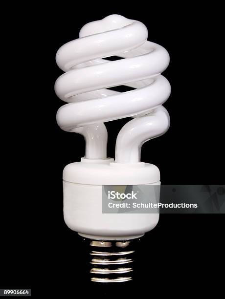 Energy Saver Bulb Stock Photo - Download Image Now - Black Background, Black Color, Breaking New Ground