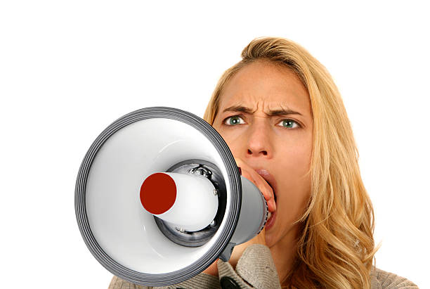 istock Mad Woman Screaming into Megaphone 89907114