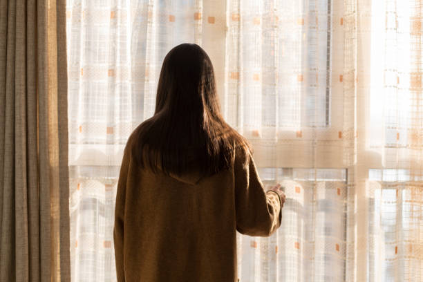 istock woman spending her leisure time in home 899074272