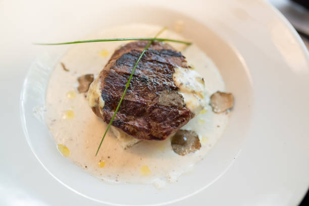 istock Directly above view of filet mignon with grated truffles 899074506