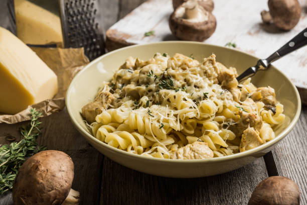 istock Fresh pasta with meat, mushrooms and herbs 899082052