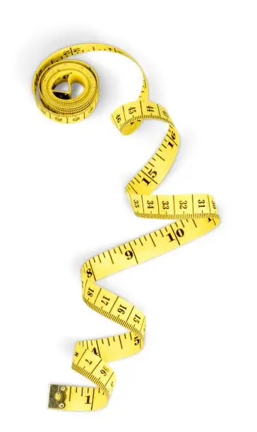 Yellow measuring tape isolated on white background