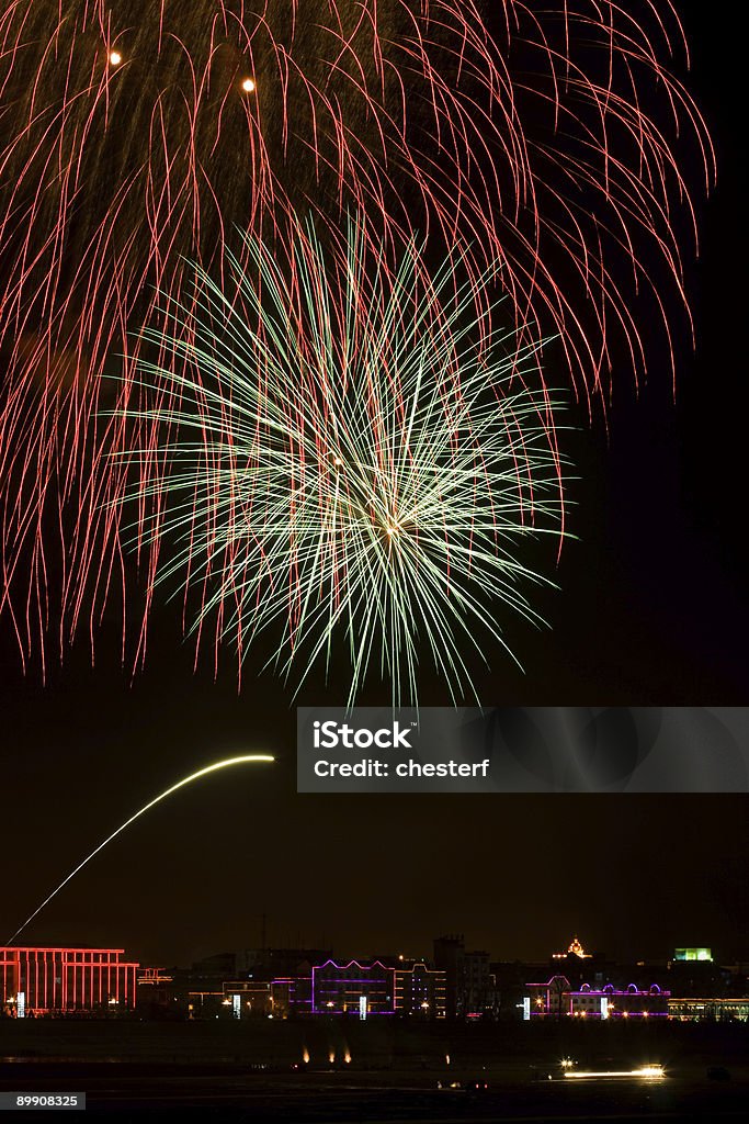 blowing fireworks over the buildings  Beauty Stock Photo