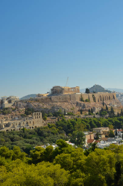 istock Parthenon acropolis among pine trees  Athens Greece 899083318