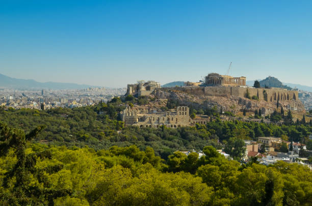 istock Parthenon acropolis among pine trees  Athens Greece 899086072