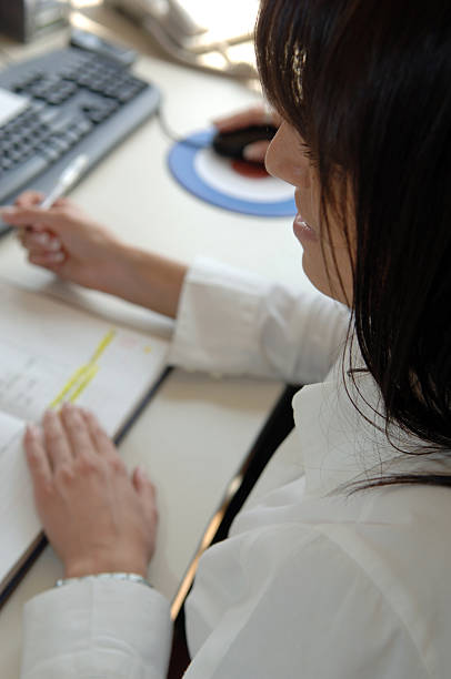 istock Businesswoman writing 89909058
