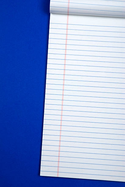 Cuaderno sobre azul - foto de stock