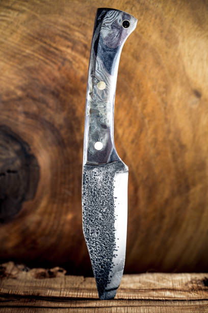 istock Custom Made Knife on Wooden Background 899094742