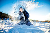 Woman Having Fun On Snowy Fields