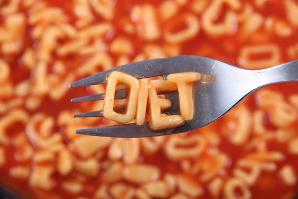 istock Spaghetti letter spelling the word diet with the letters held up on a fork. 899099678