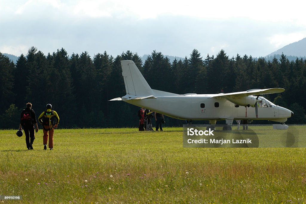 Aviator Skydiver. Parachutists going out in the plane. Air Vehicle Stock Photo