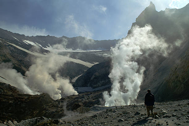 White smoke billowing out of the  apex of throut of the Chaiten Volcano is actually a mix of mostly water vapor, carbon dioxide, and sulfur gases. Location: Chaitén Los Lagos, Chile
