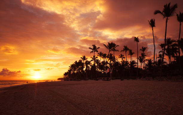 istock Red tropical sunrise over Atlantic Ocean coast 899103610